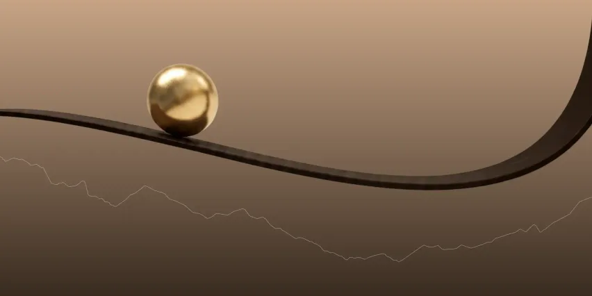 Gold sphere resting at the crest of a dark curve that bends downward, with a faint price chart line tracing a decline beneath it