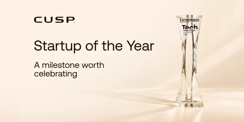 CUSP Wealth “Startup of the Year” banner beside the crystal Entrepreneur Middle East Tech Innovation Awards 2026 trophy
