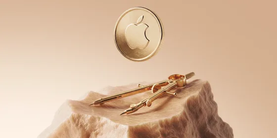 Gold Apple-logo coin floating above a stone plinth with a gold drafting compass