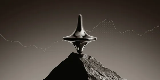 Chrome spinning top balancing on a rock peak against a market volatility chart — a metaphor for portfolio risk